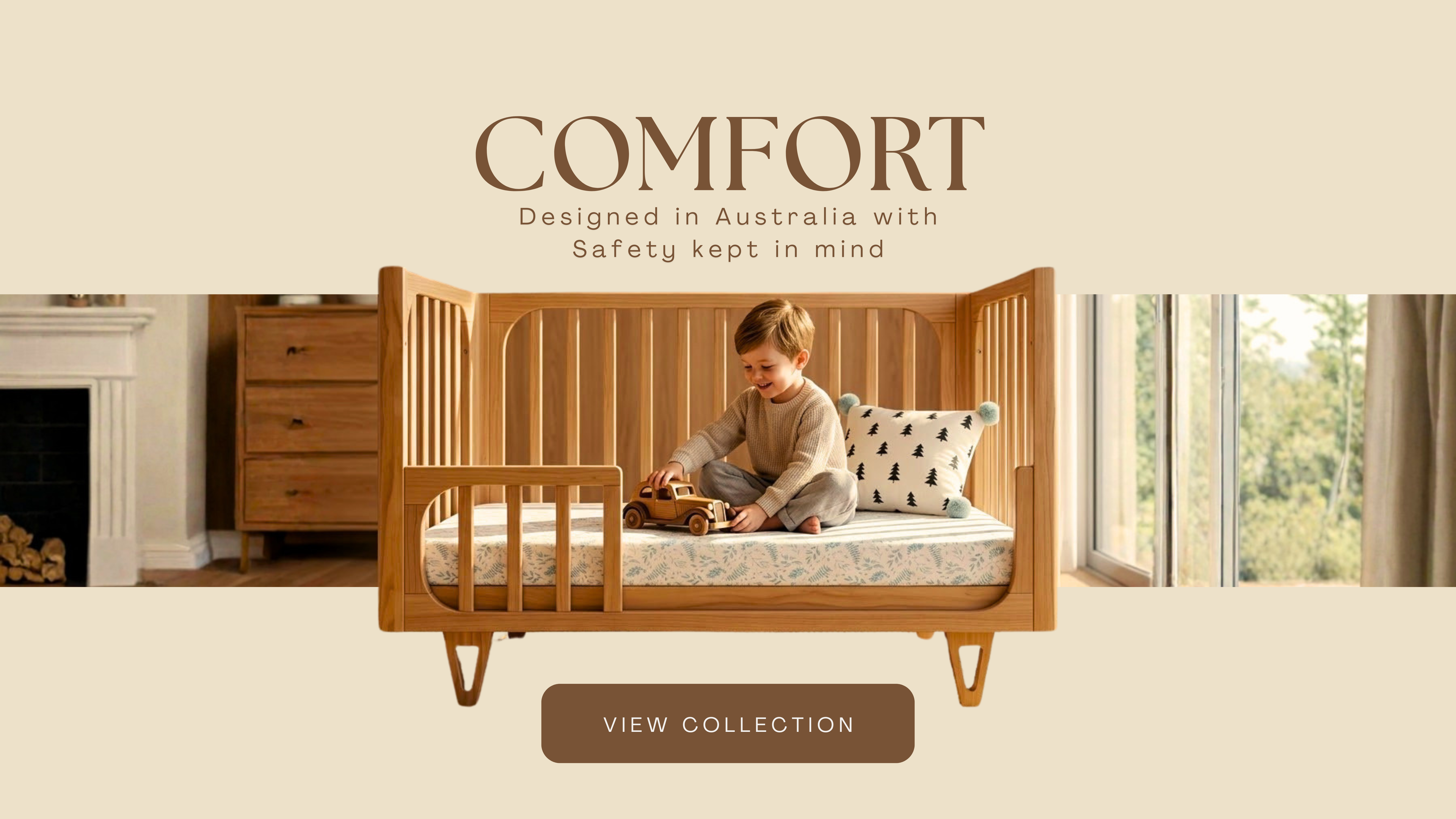 Toddler sitting and playing with a wooden toy car on a Cocoon Piccolo cot converted to toddler bed with a patterned fitted sheet — Cocoon nursery furniture designed in Australia with safety in mind.
